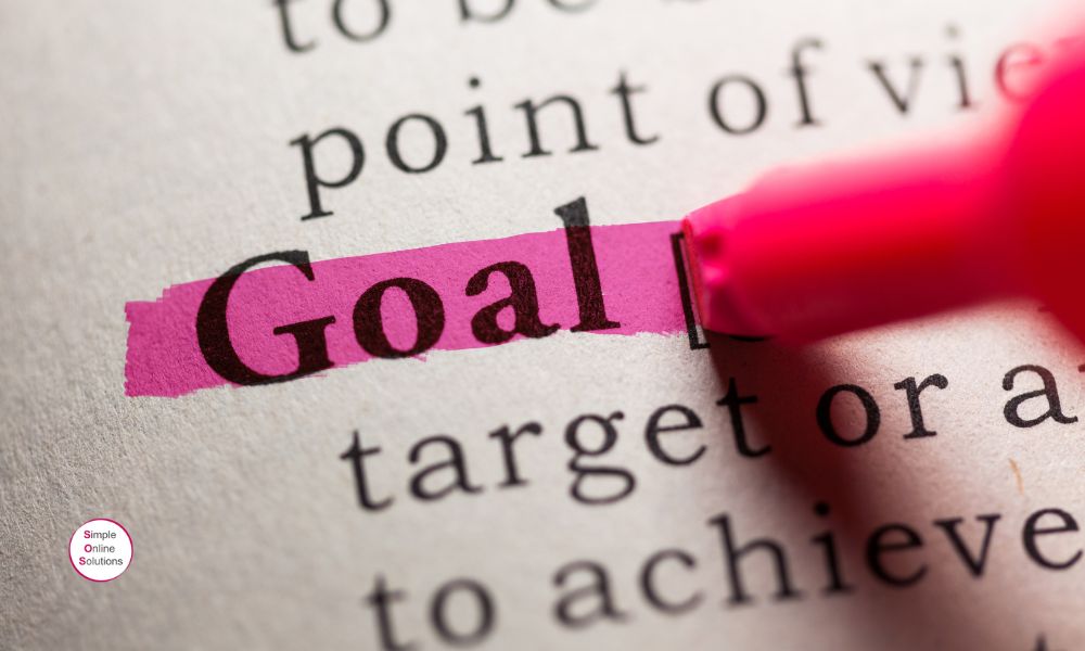 The word Goal being highlighed in pink on typed document